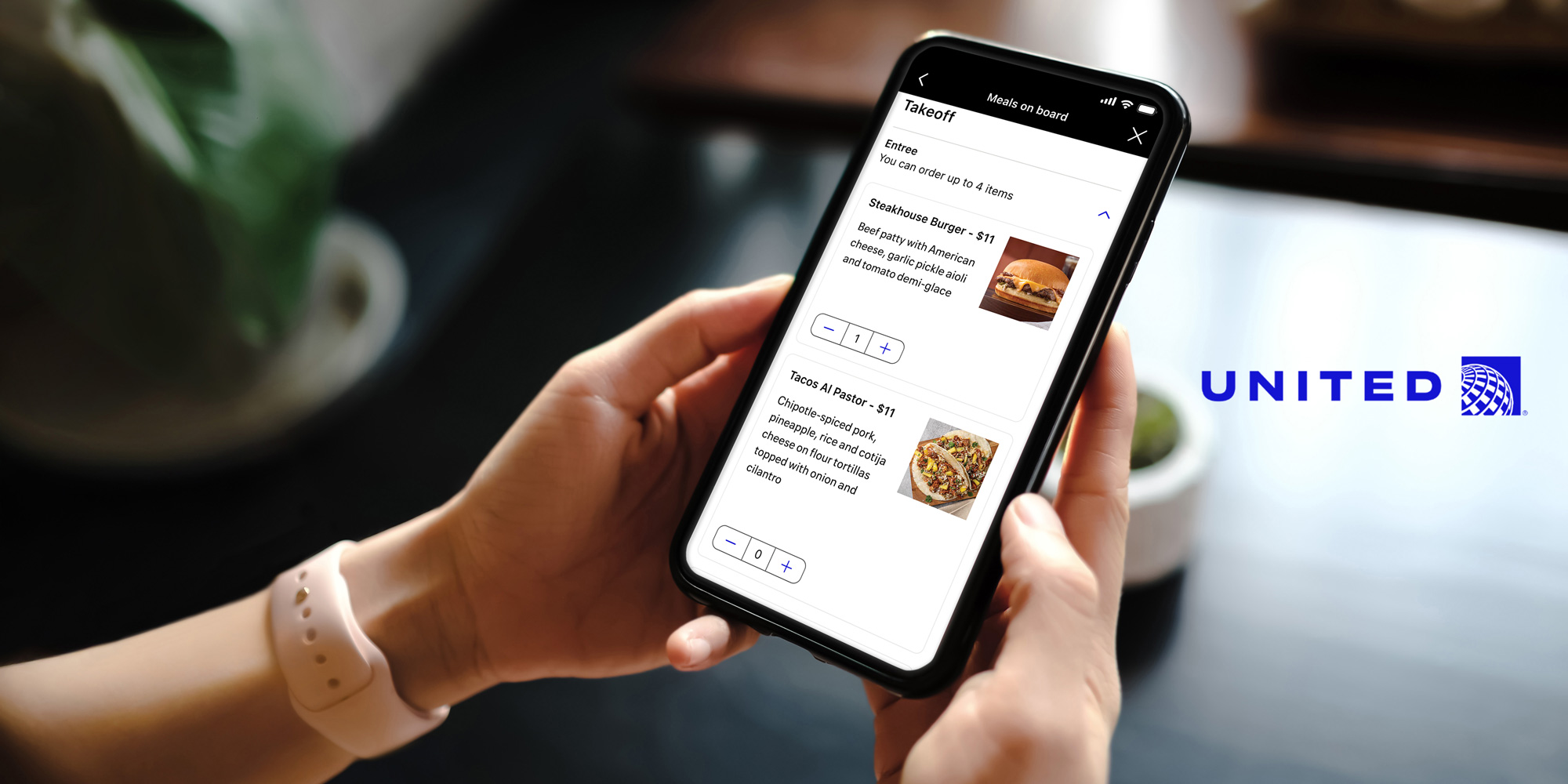 Close,Up,Of,Woman,Using,Cell,Phone,sending,Massages,On,The united compra comidas
